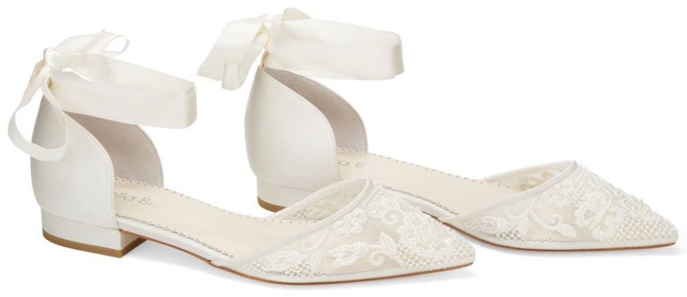 Reminiscent of traditional ballet slippers, the Ivy flats have pearl bead embellishments and silky ivory ribbons that loop around the ankle and knot into an elegant trim bow