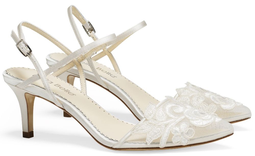 The Serena slingback pumps feature a hand-sewn lace rose at the center, two straps that cross the ankle, and 2.5-inch kitten heels