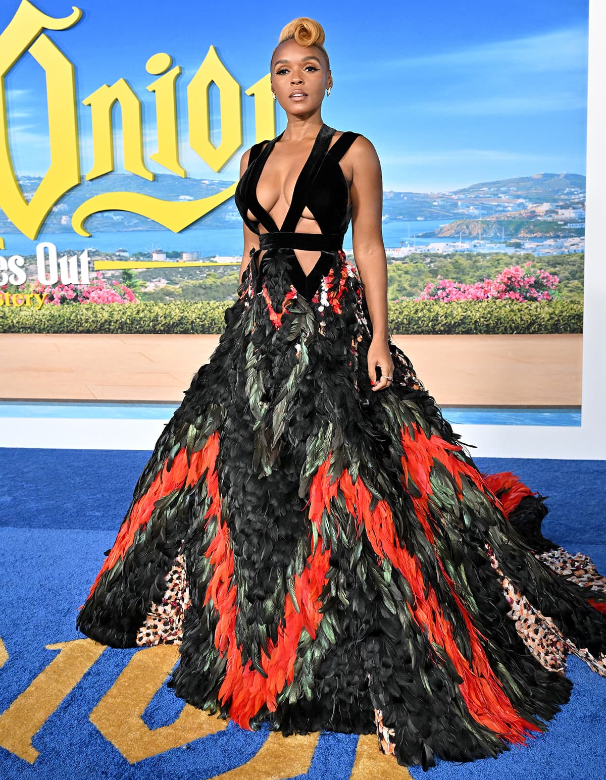 Janelle Monae flaunts her boobs in an Elie Saab cutout feathered gown