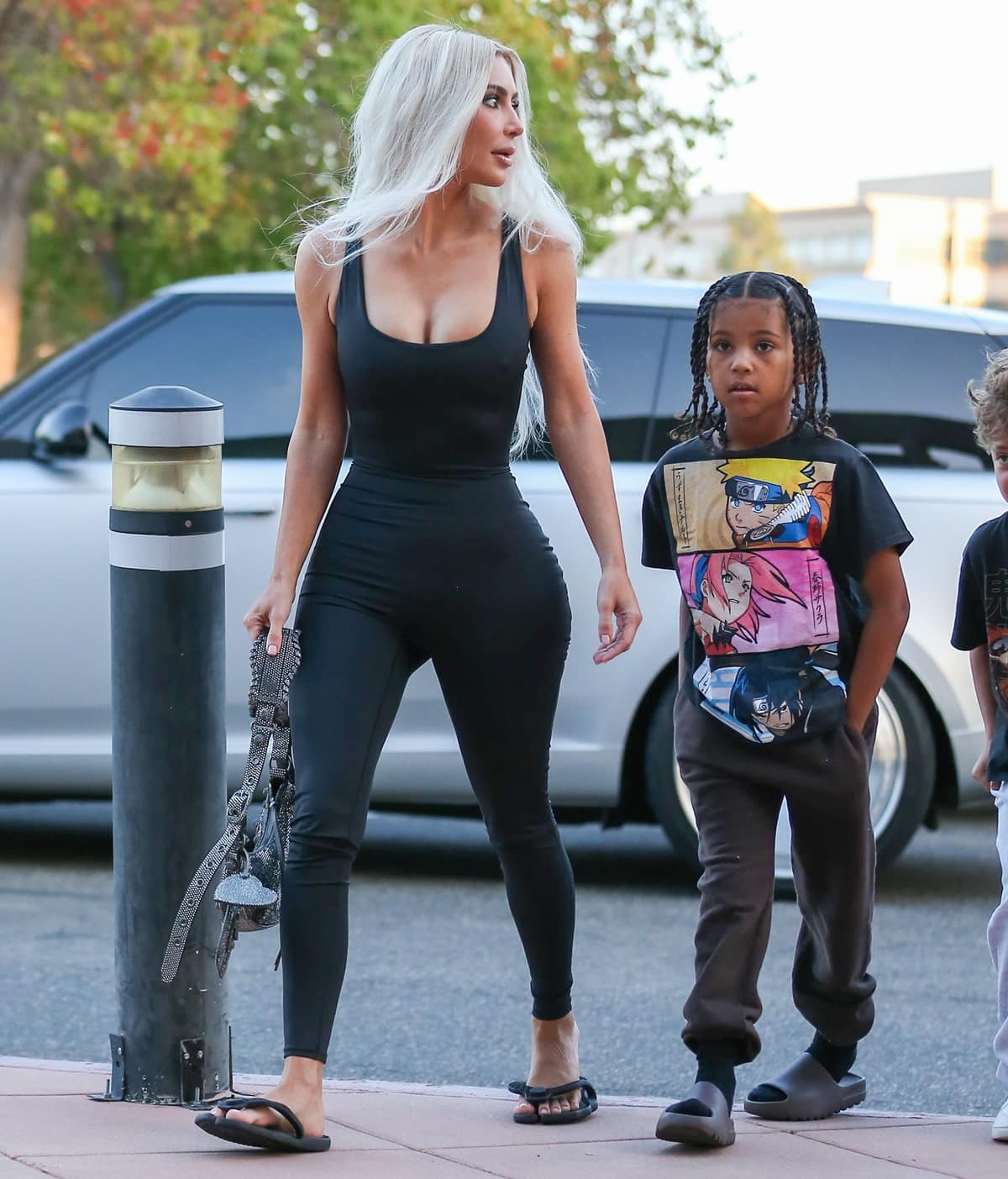 Kim Kardashian arrives with her 6-year-old son, Saint, to watch North's basketball game in Calabasas