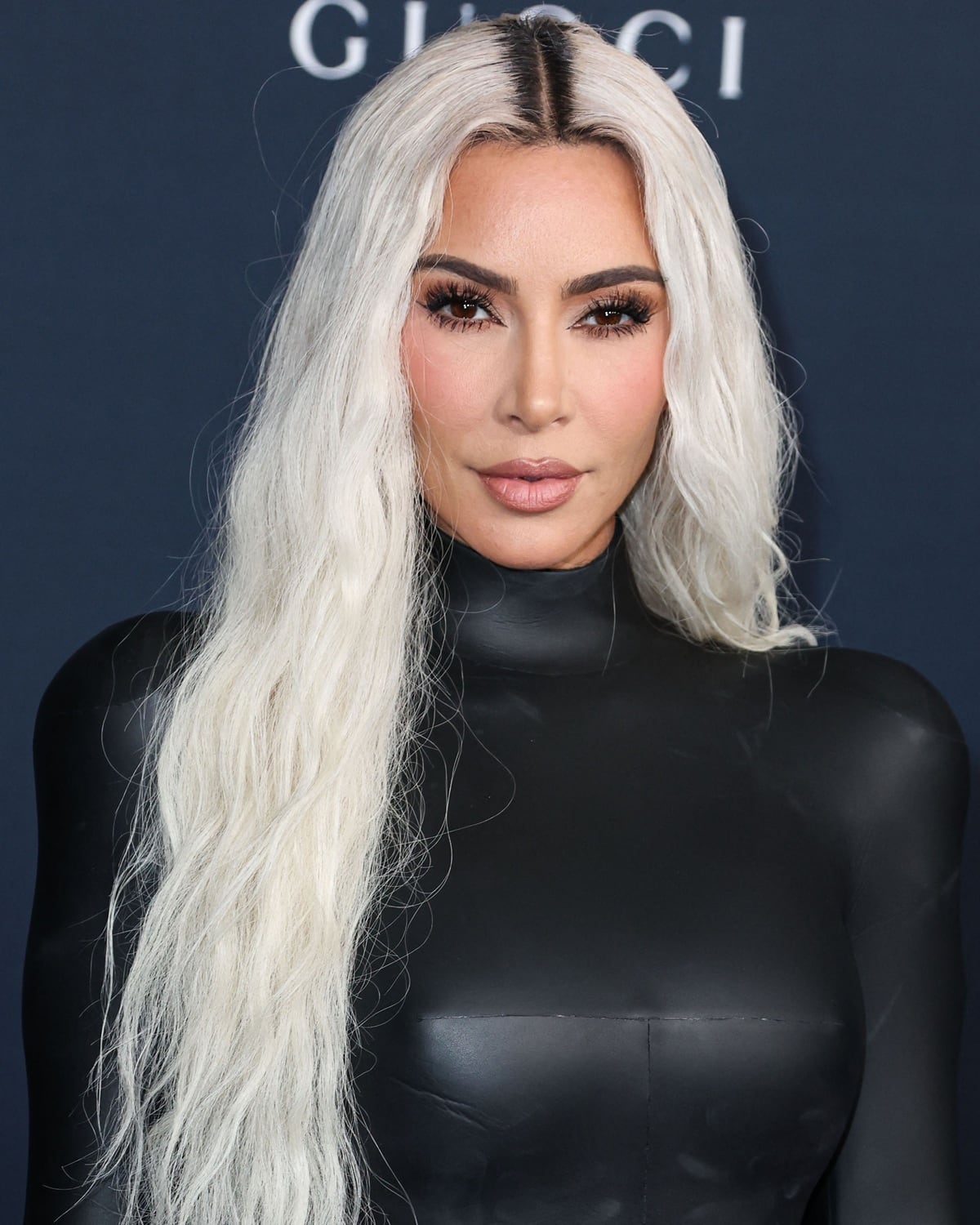 Kim Kardashian flaunted her curves in a skintight vinyl Balenciaga dress