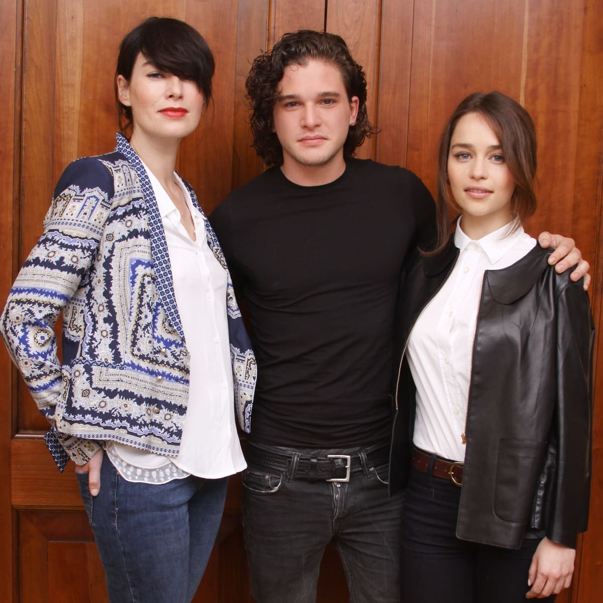 Emilia Clarke (R) looks short standing next to Lena Headey and Kit Harington at the "Game Of Thrones" Press Conference