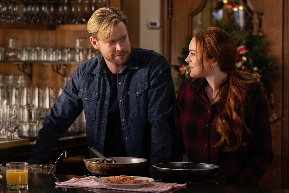 Lindsay Lohan as Sierra Belmont / Sarah and Chord Overstreet as Jake Russell in Janeen Damian's directorial debut Falling for Christmas