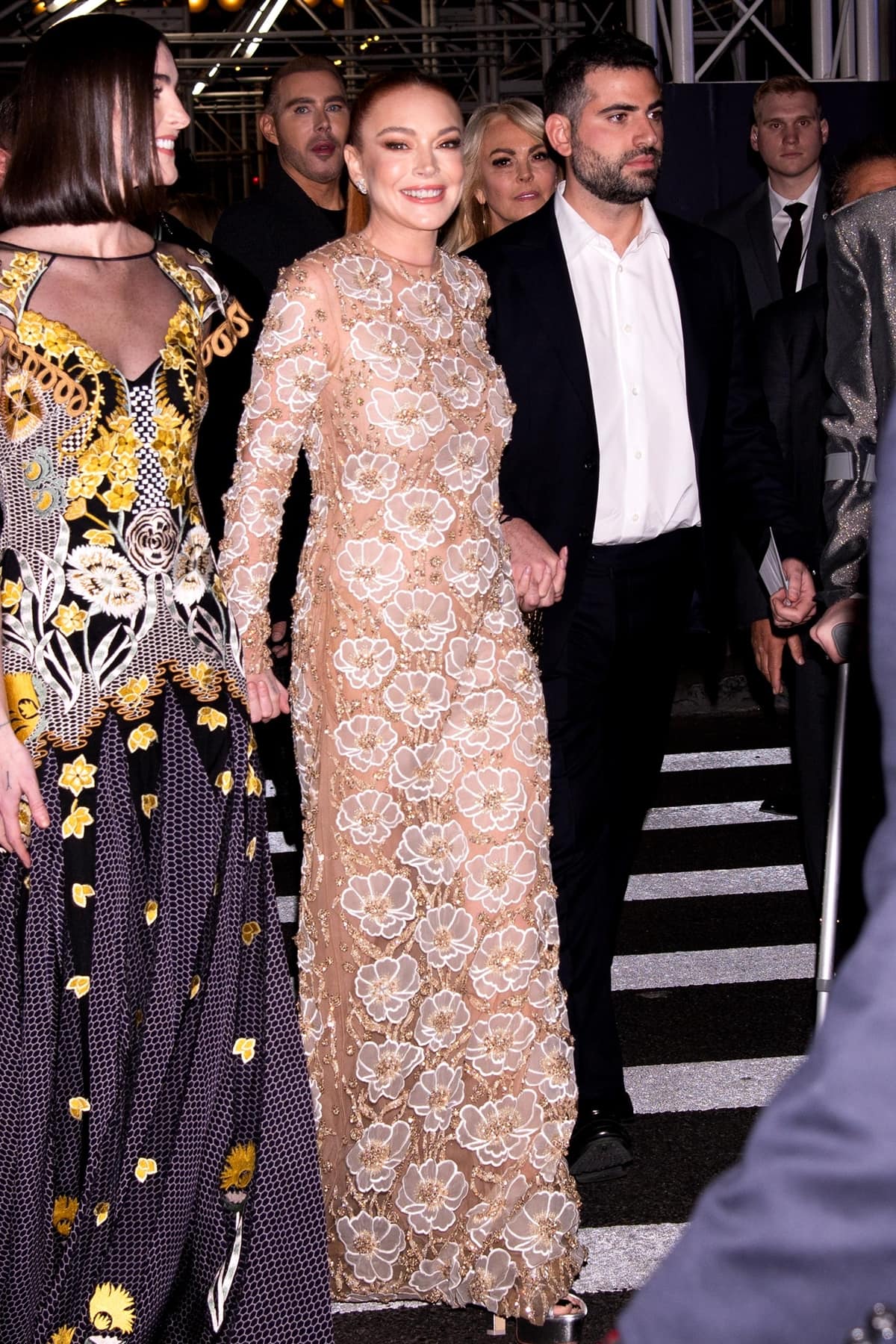 Lindsay Lohan with her husband Bader Shammas and her younger sister Aliana Taylor "Ali" Lohan at Netflix’s Falling For Christmas Celebratory Holiday Fan Screening