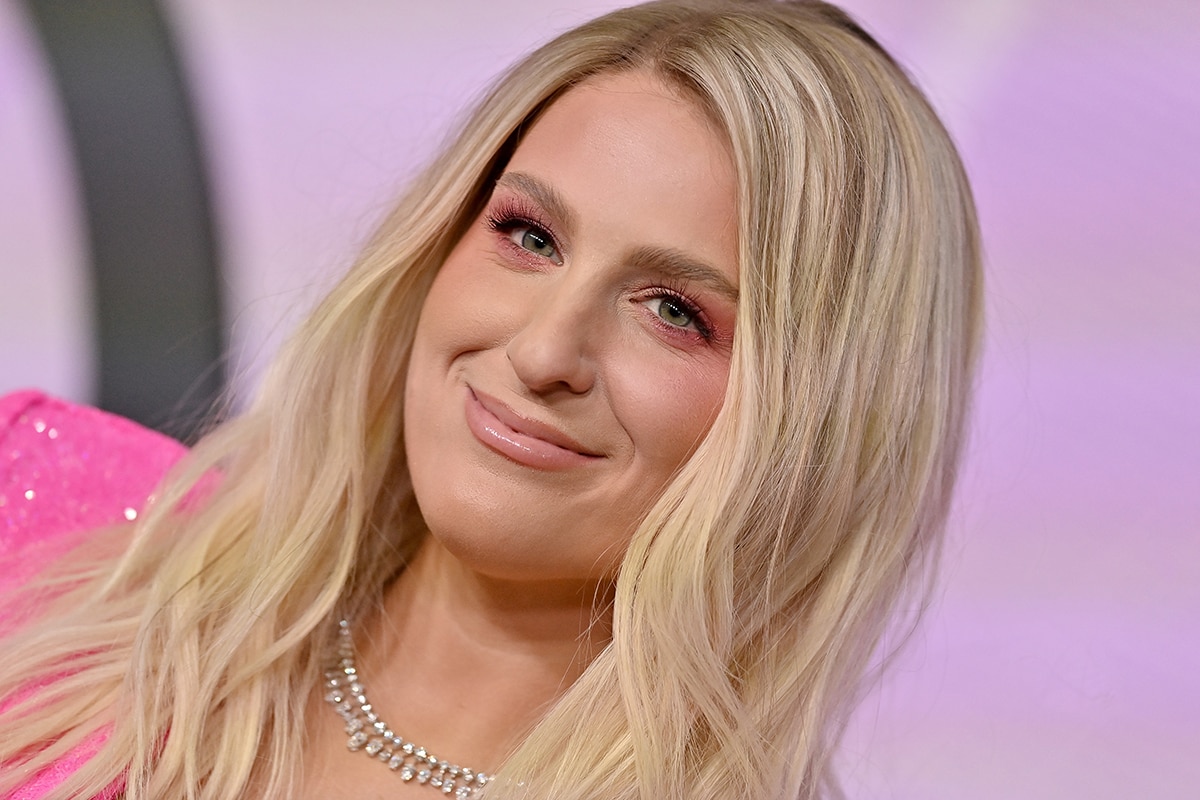 Meghan Trainor completes her Barbie look with a platinum shag and soft pink makeup