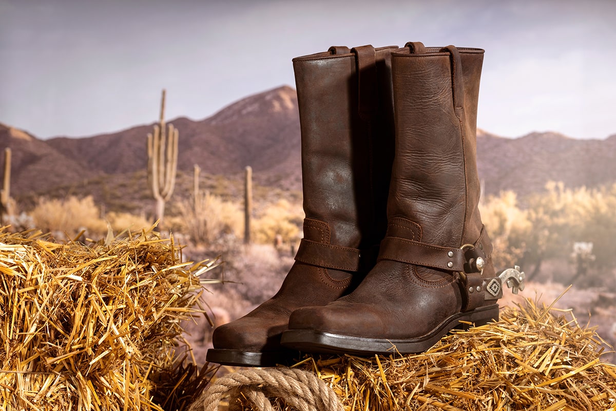 Cowboy boots have an iconic profile, with functional features such as leather upper, narrow toe box, and short heel