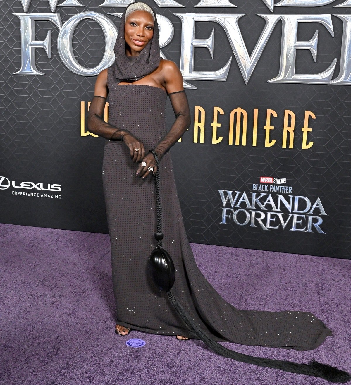 Michaela Coel in a custom Salvatore Ferragamo hooded gown and Ferragamo sandals