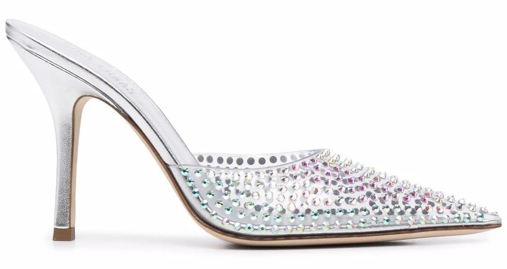 These shoes are studded with crystals and feature a slip-on style and a backless design