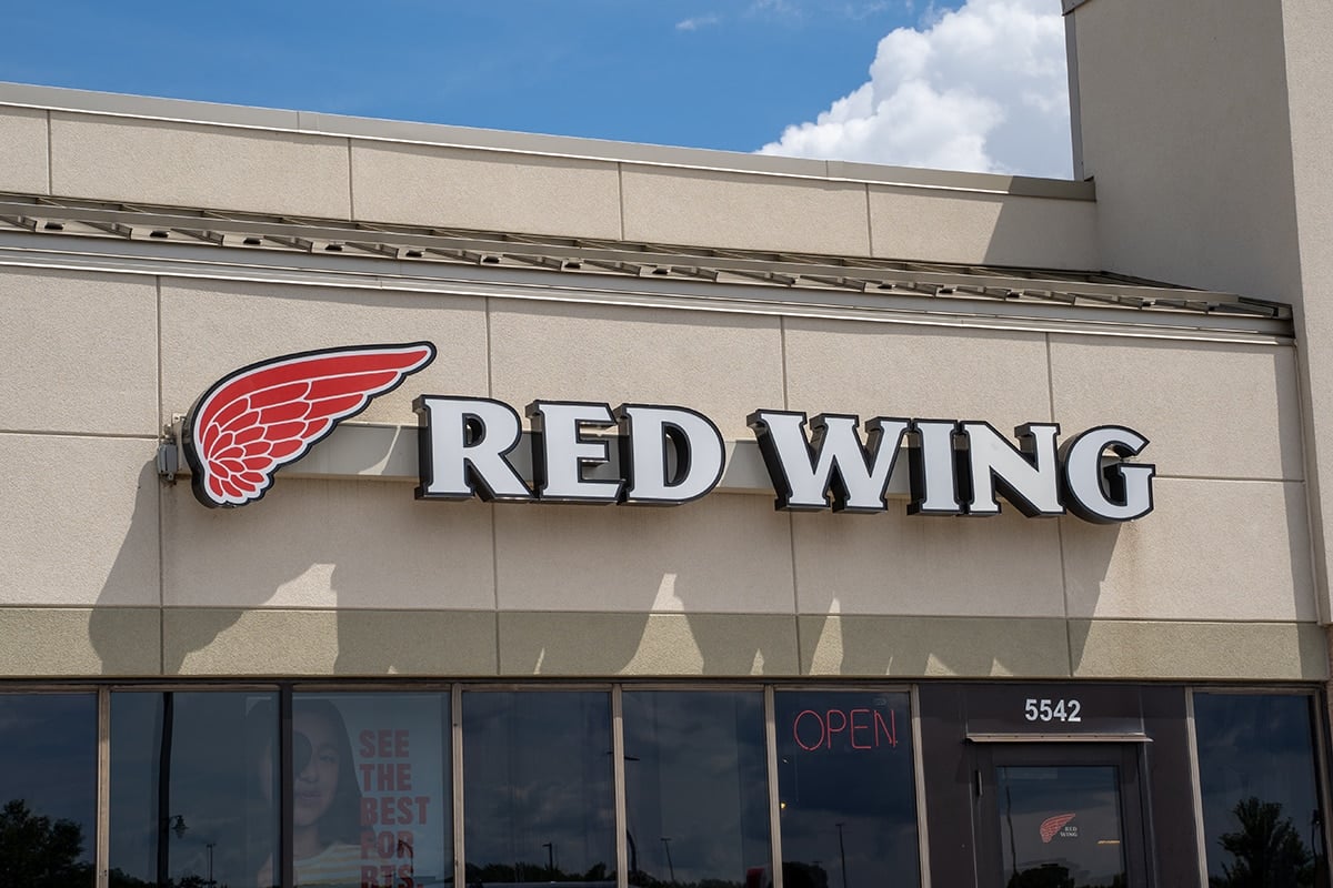 Red Wing Shoes storefront, showcasing the brand's iconic wing logo, known for its durable American-made footwear