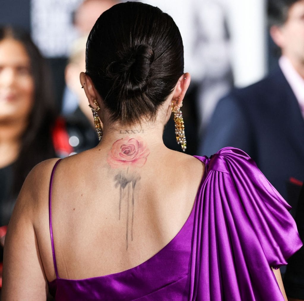 Selena Gomez And Cara Delevingne s Matching Rose Neck Tattoos Hidden 