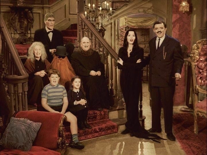 The cast of the 1964 dark comedy sitcom The Addams Family based on the characters from Charles Addams’ New Yorker cartoons
