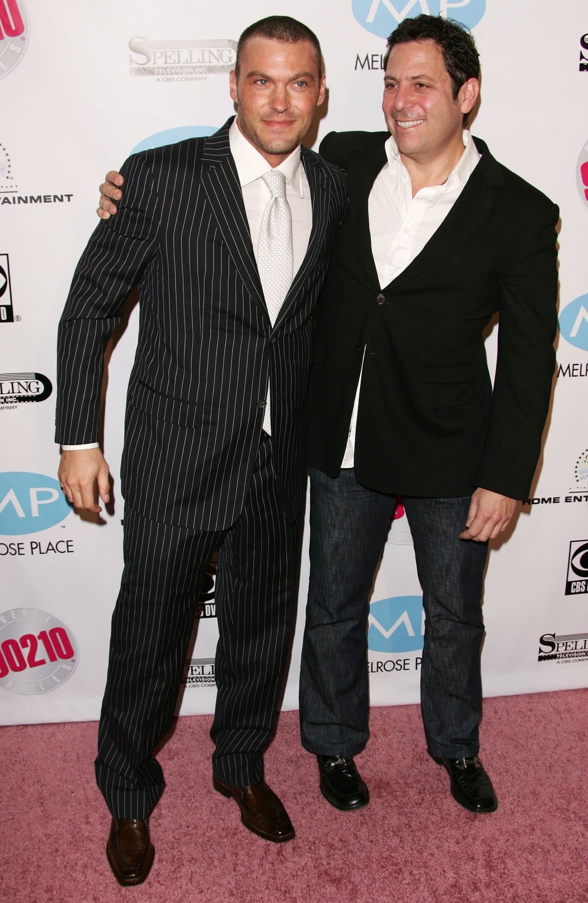 Actor Brian Austin Green (left) and producer Darren Star arrive at the "Beverly Hills, 90210 The Complete First Season" DVD Party