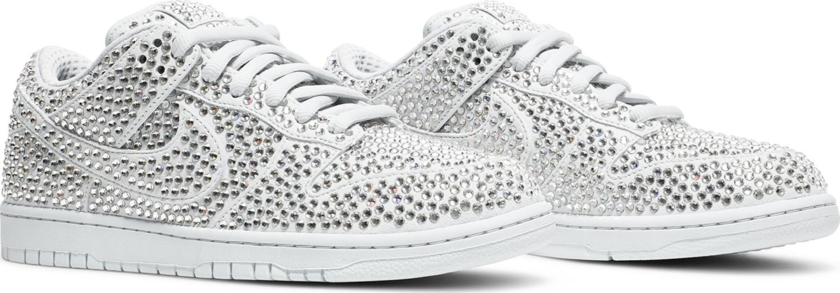 An opulent take on the classic Dunk Low, this CPFM x Swarovski collaboration is entirely covered in Swarovski crystals and features detachable double lace flaps, heavily padded tongue, and oversized Swoosh