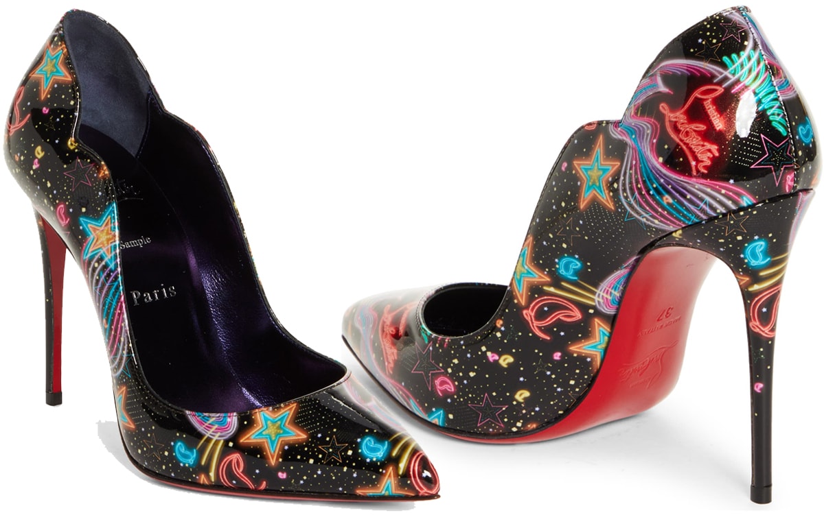 The Hot Chick Pumps in Starlight feature a scalloped counter and a star-spangled design