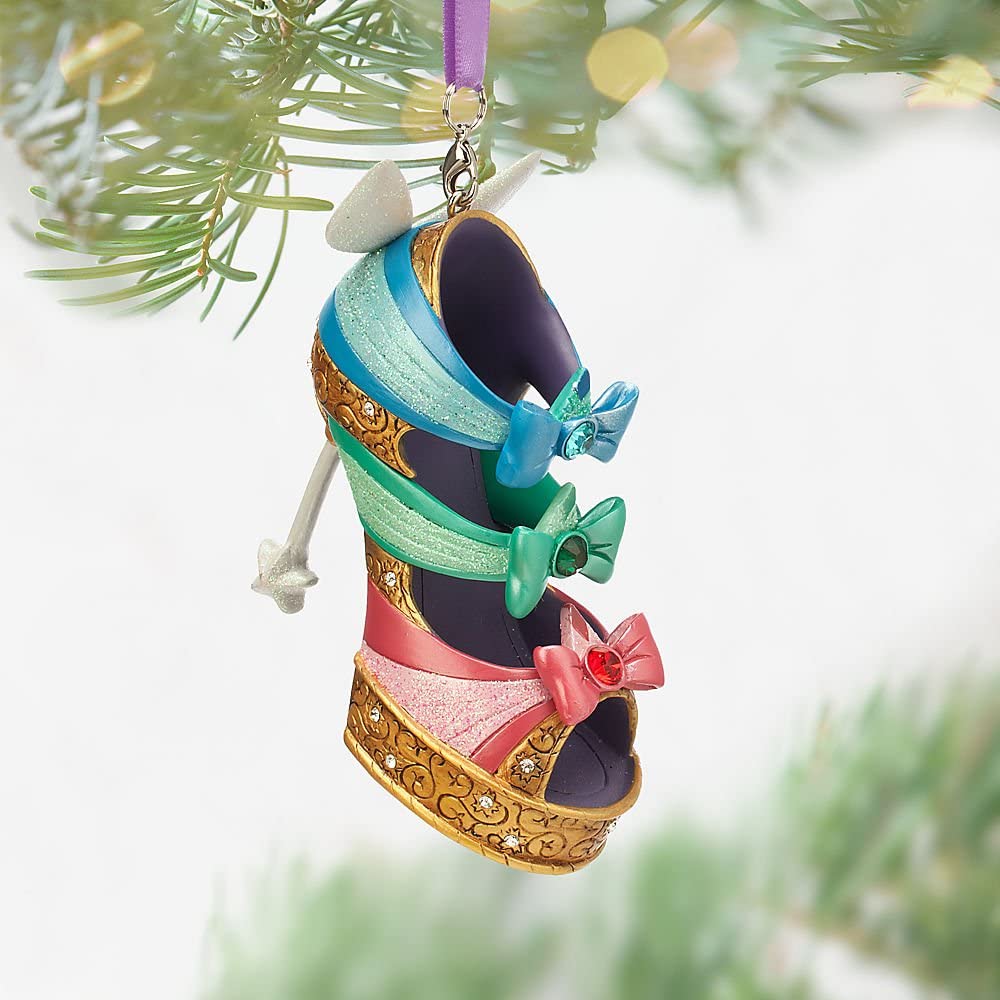 The colorful straps are inspired by Flora, Fauna, and Merryweather, while the heel is a magic wand