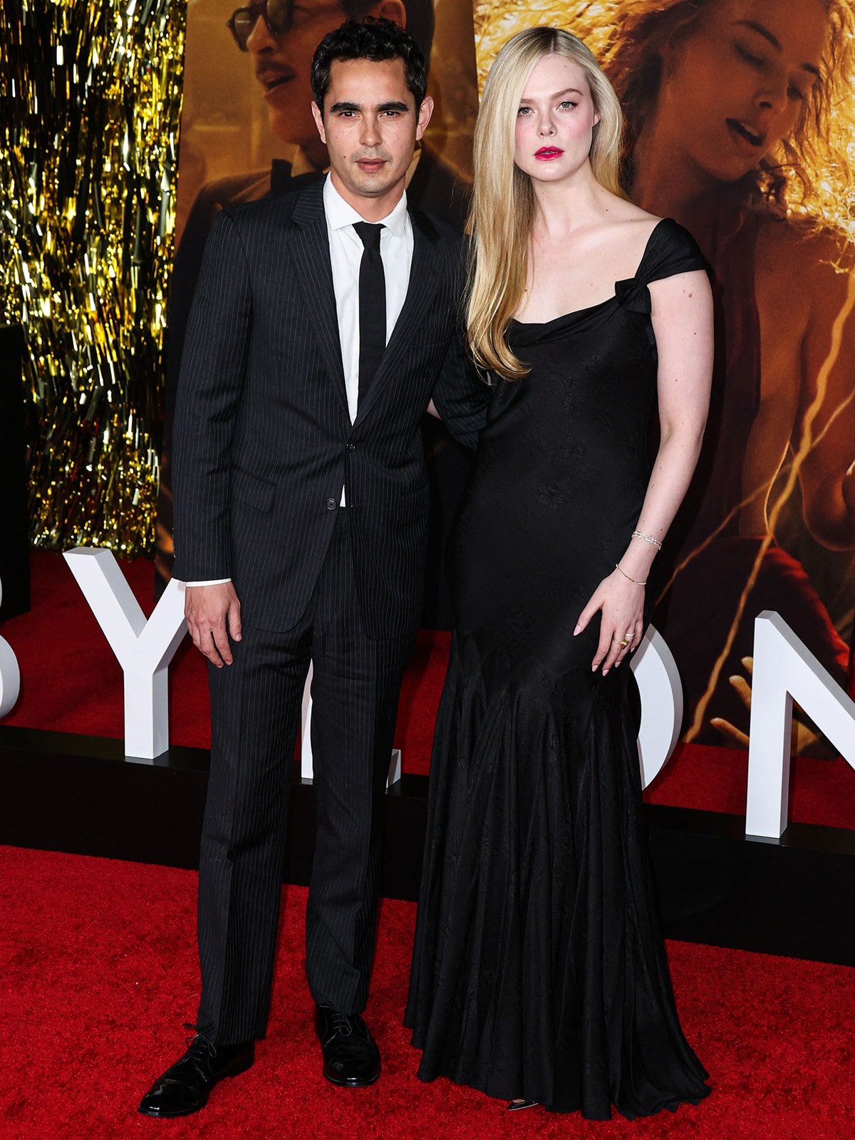 Max Minghella and Elle Fanning make a rare public appearance at the Babylon global premiere