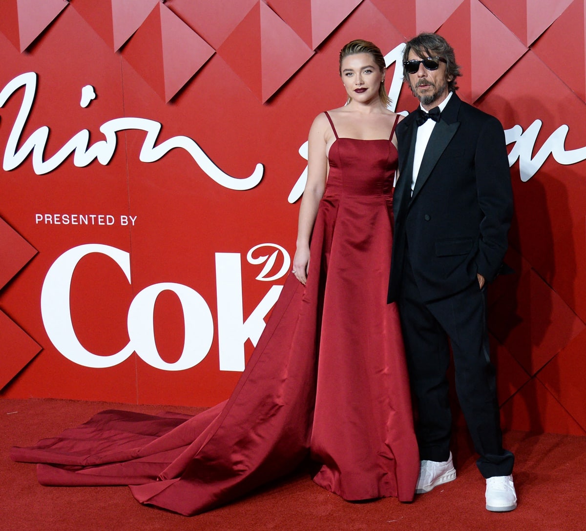 Florence Pugh and Pierpaolo Piccioli attend The Fashion Awards 2022