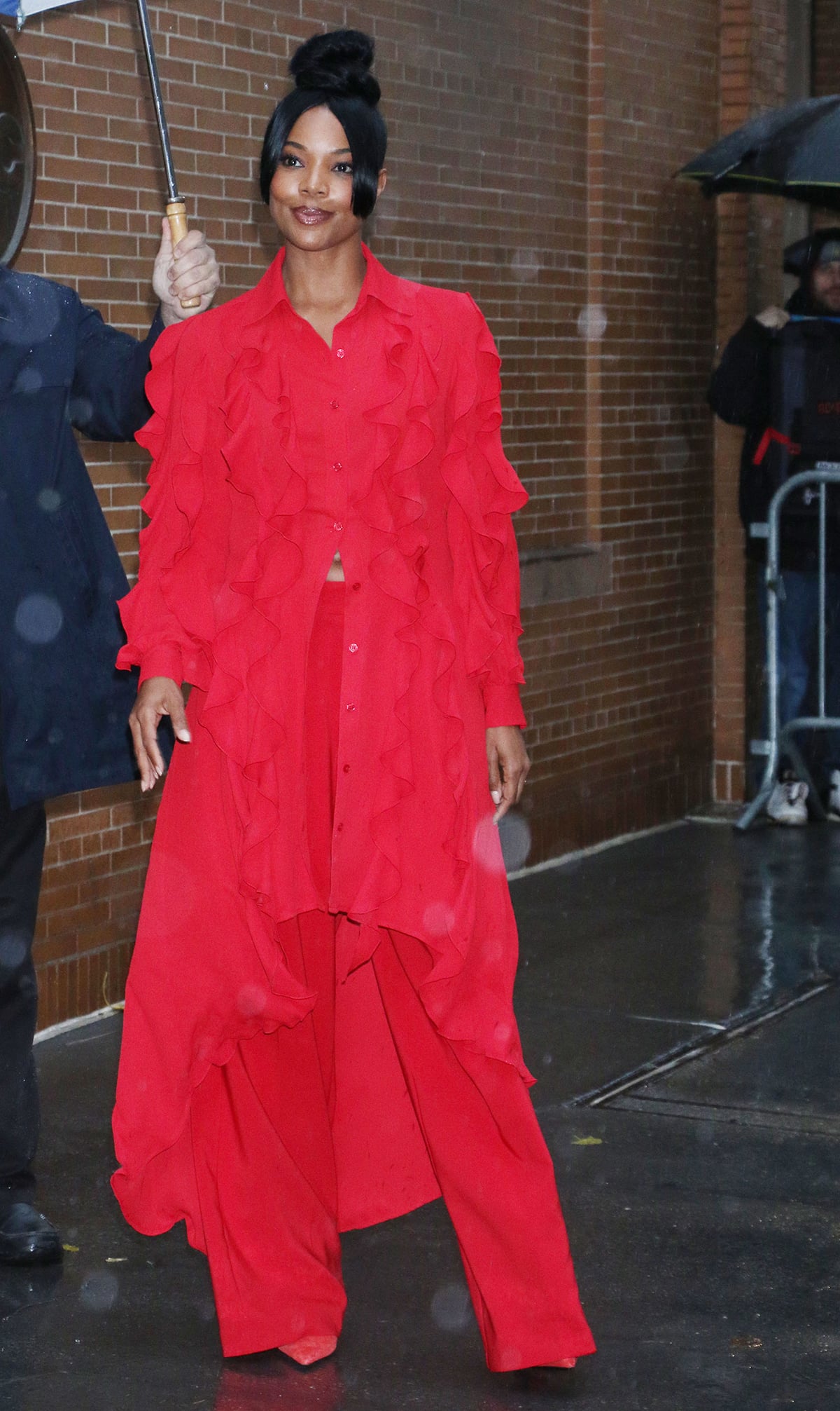 Gabrielle Union drops by The View in a red ruffle shirtdress and wide-leg trousers from her collection with NY and Company