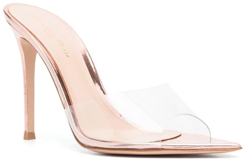 The Gianvito Rossi Elle mules feature clear open-toe straps, pointed toes, and stiletto heels