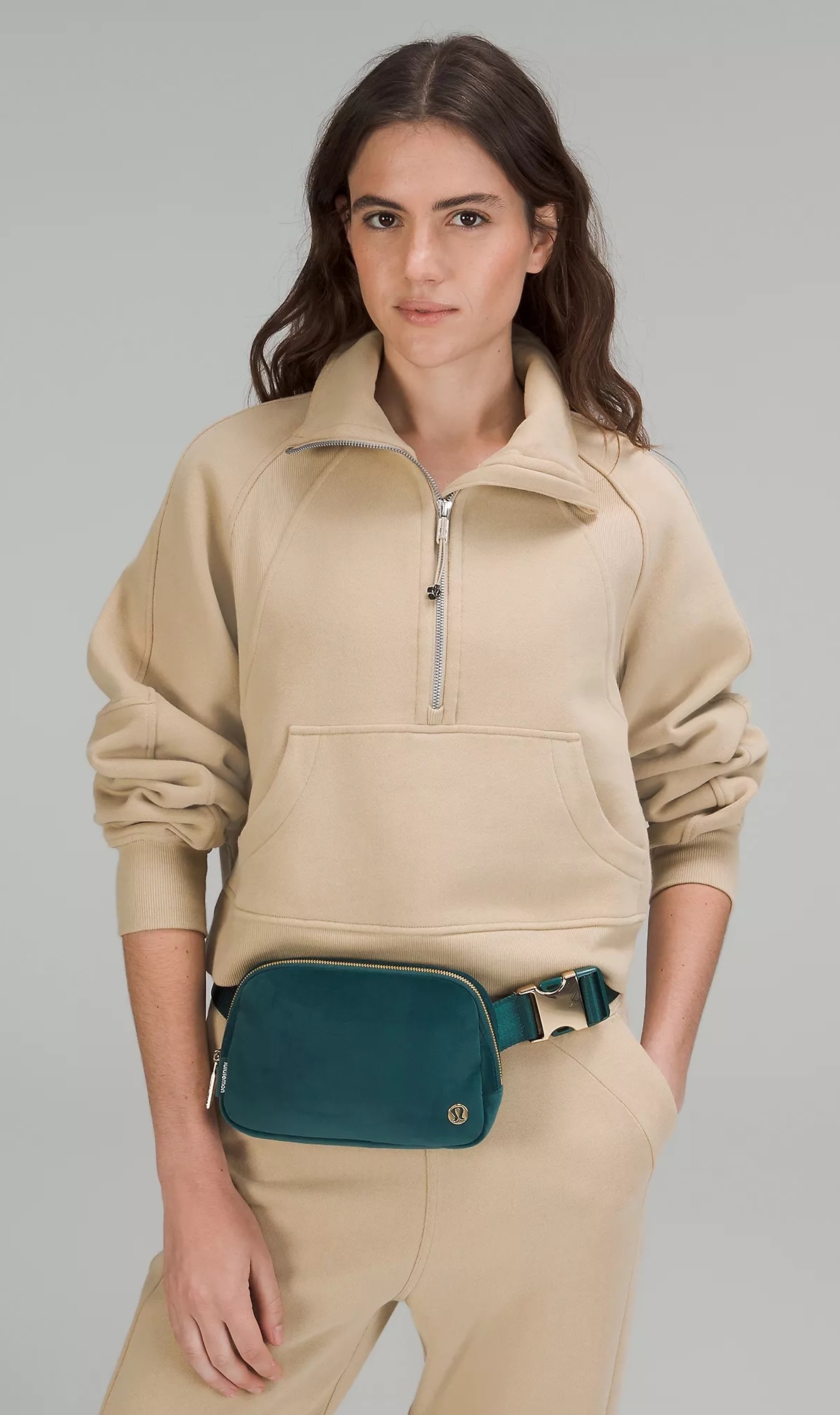 The Everywhere Belt Bag 1L in Velour Green Jasper/Gold, priced at $64, combines style and functionality