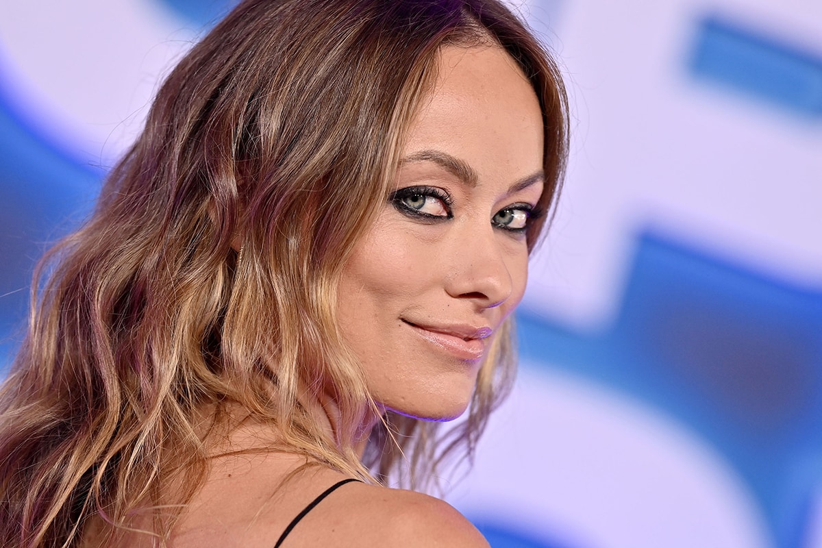 Olivia Wilde keeps the look sultry with smudged eyeliner and a hint of lip oil