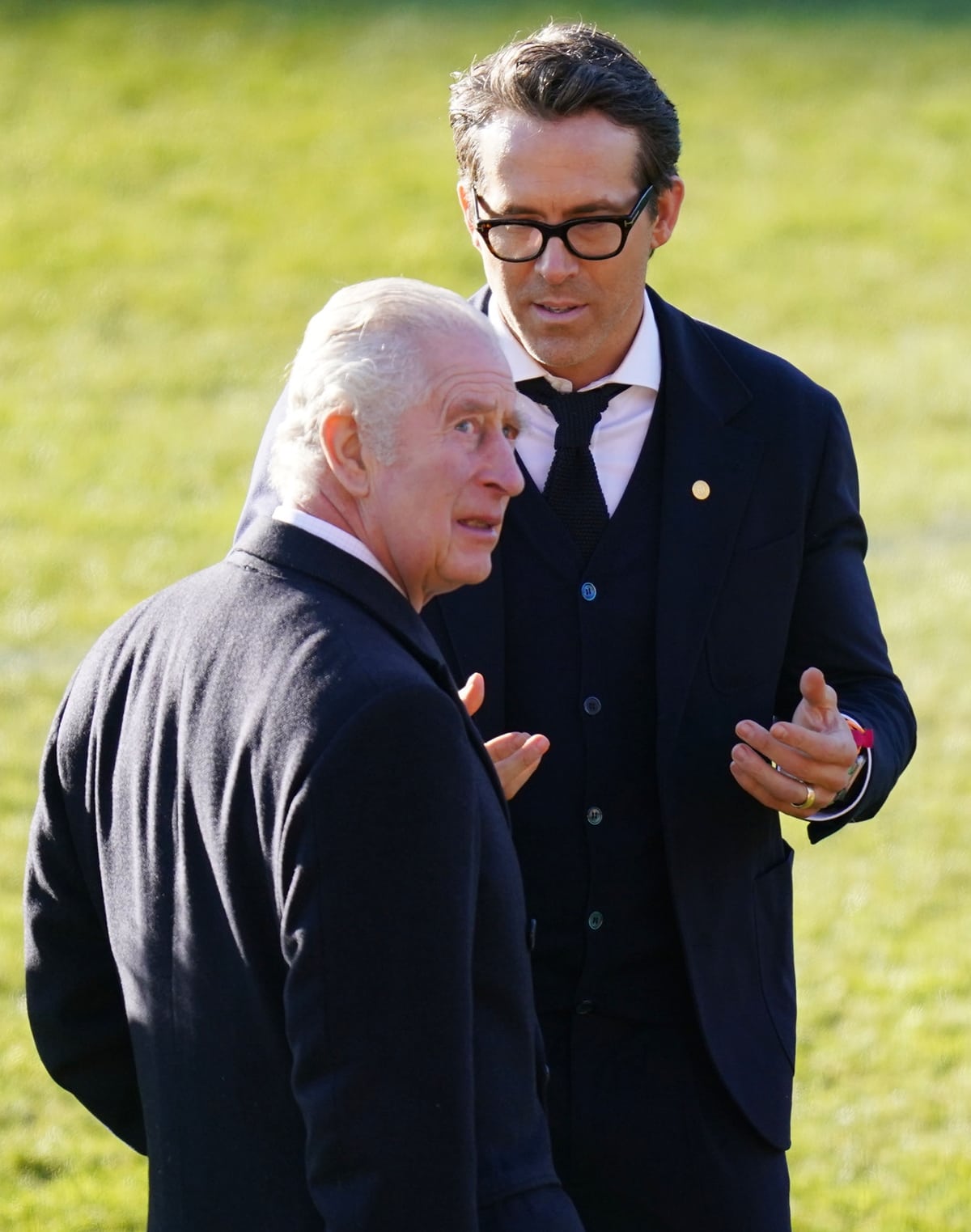 Mint Mobile owner Ryan Reynolds chats with King Charles III at the Racecourse Ground Stadium