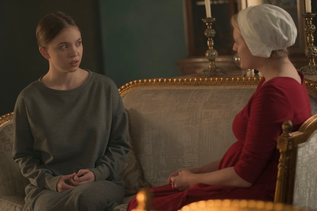 Sydney Sweeney as Eden Blaine (née Spencer) and Elisabeth Moss as June Osborne / Offred / Ofjoseph in the American dystopian television series The Handmaid's Tale