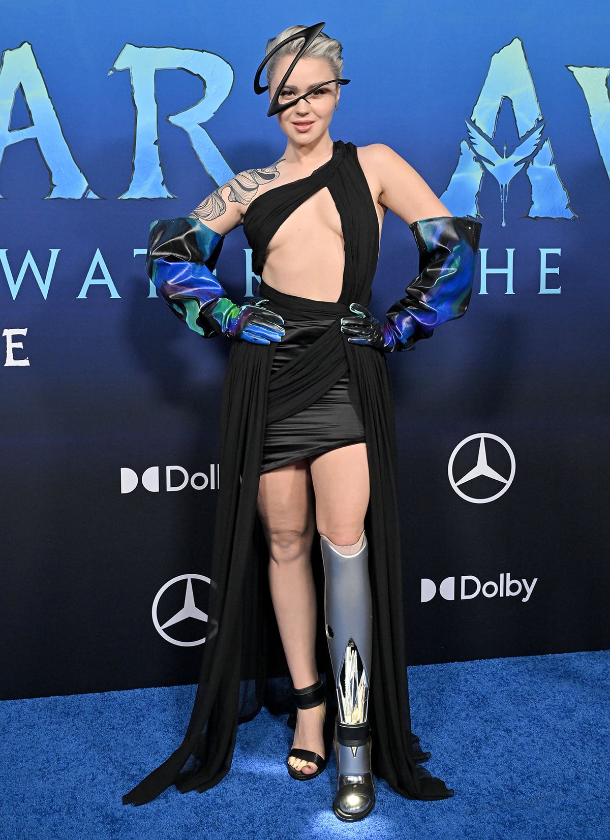 Viktoria Modesta bares her torso in an On Aura Tout Vu sheer black cutout gown