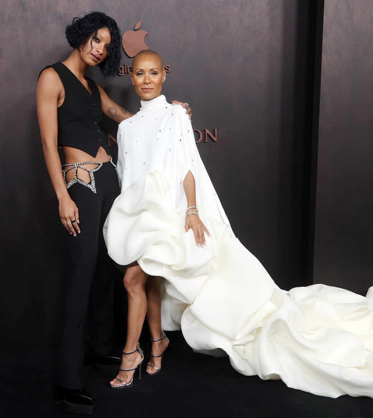 Jada Pinkett Smith in a white Stephane Rolland gown and her daughter, Willow Smith, in a black cropped vest paired with matching low-rise hip-cutout crystal-embellished pants from Stella McCartney's Spring 2023 collection