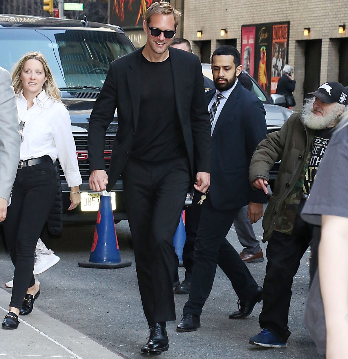 Alexander Skarsgård making everyone small in comparison while on his way to The Late Show with Stephen Colbert