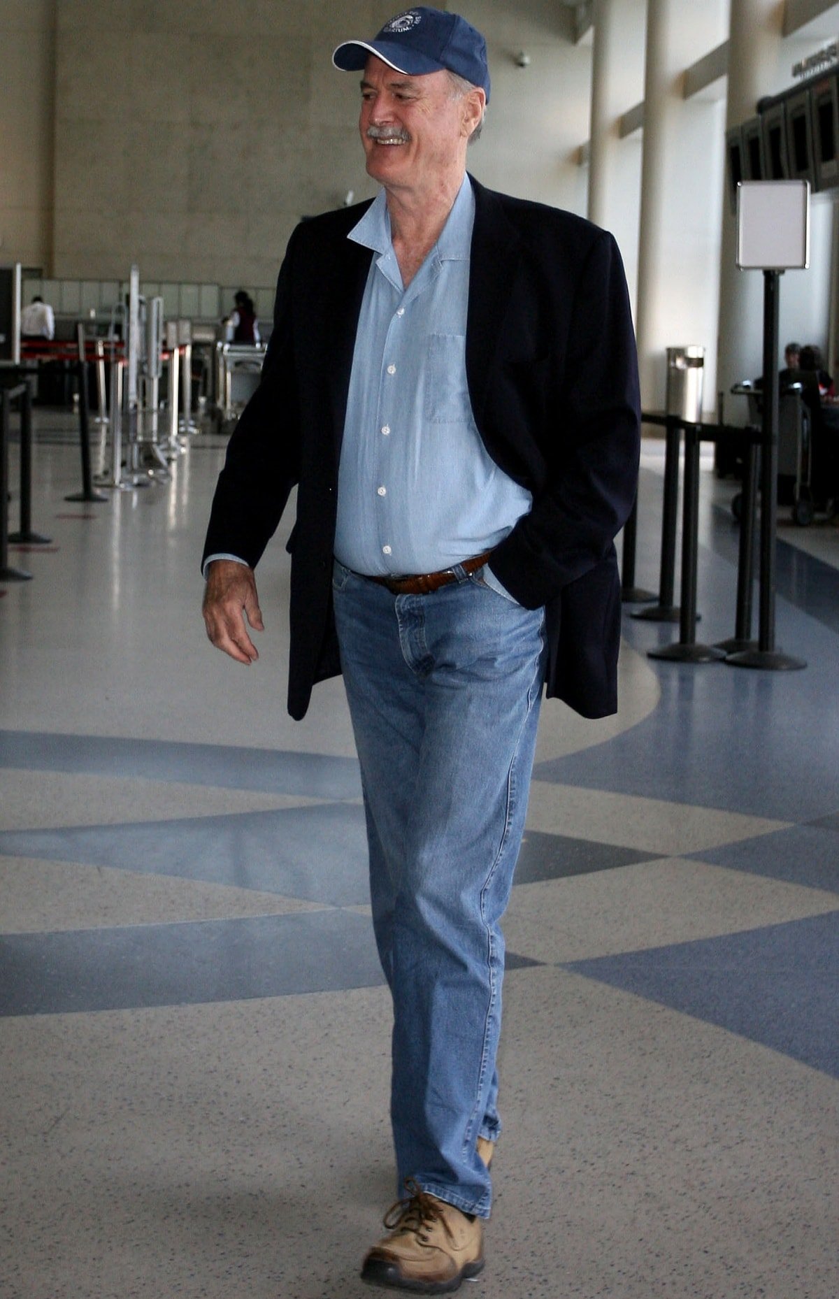 John Cleese arriving at the Los Angeles International Airport