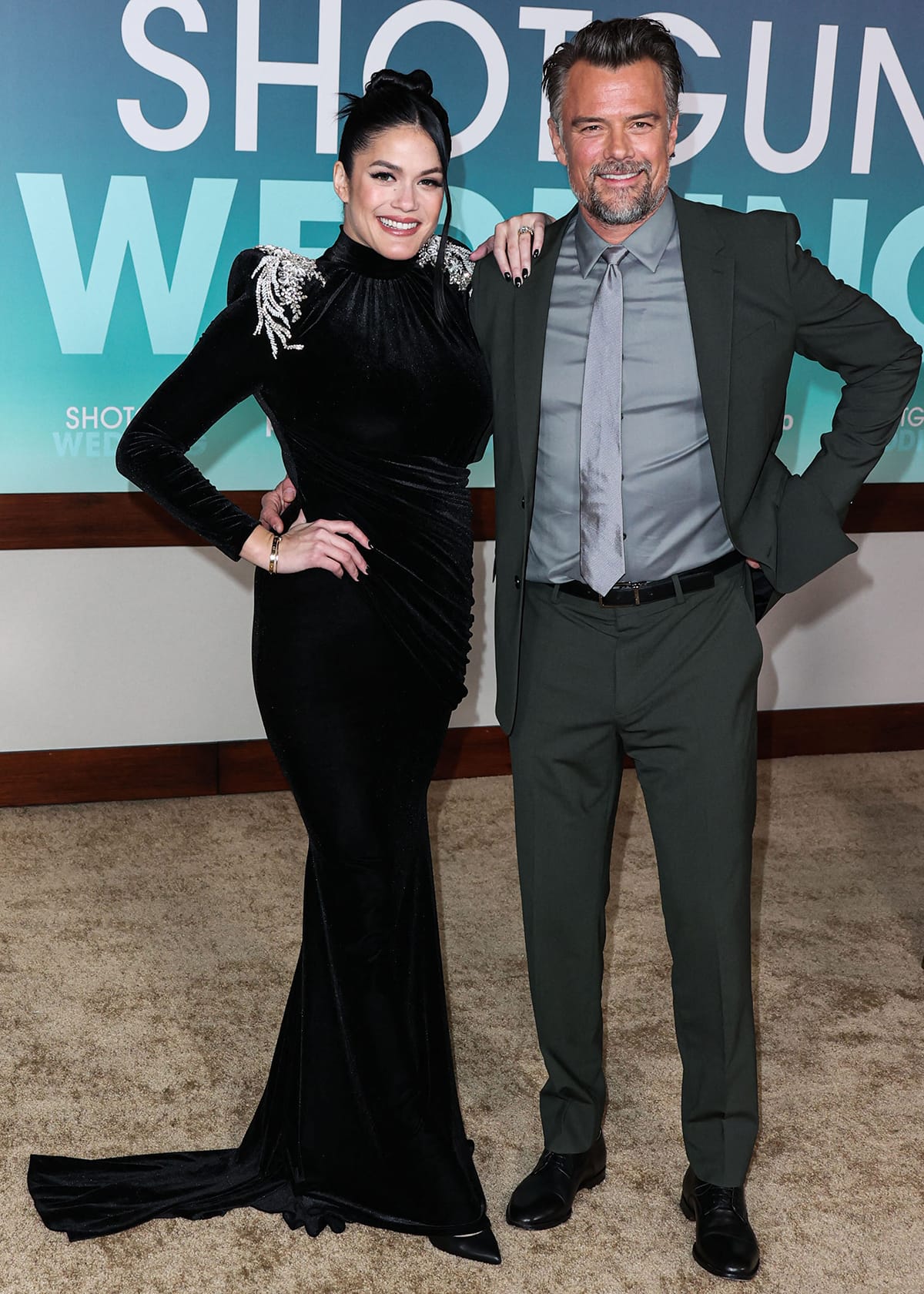 Josh Duhamel with his new wife Audra Mari in a Michael Costello black gown