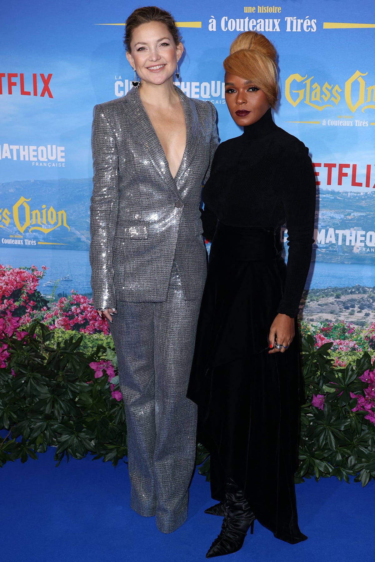 Kate Hudson poses with Janelle Monáe in a silver sequin co-ord suit by Pamela Rolland