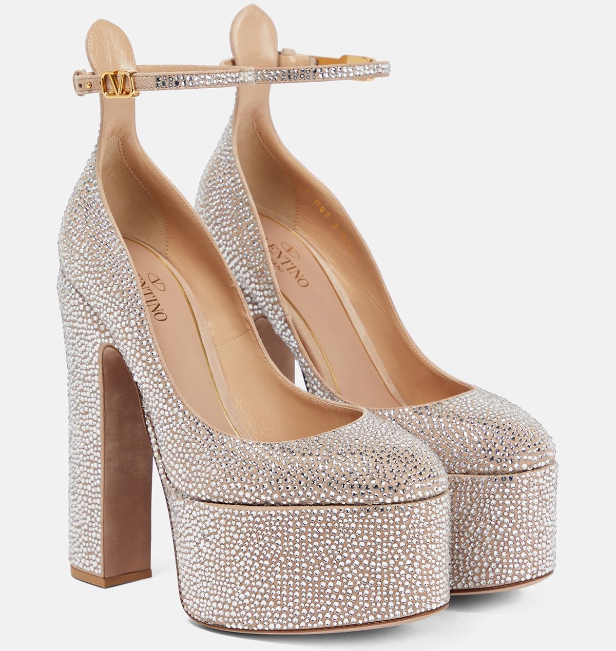 These Tan-Go pumps are embellished with crystals from the ankle straps down to the thick platforms and block heels
