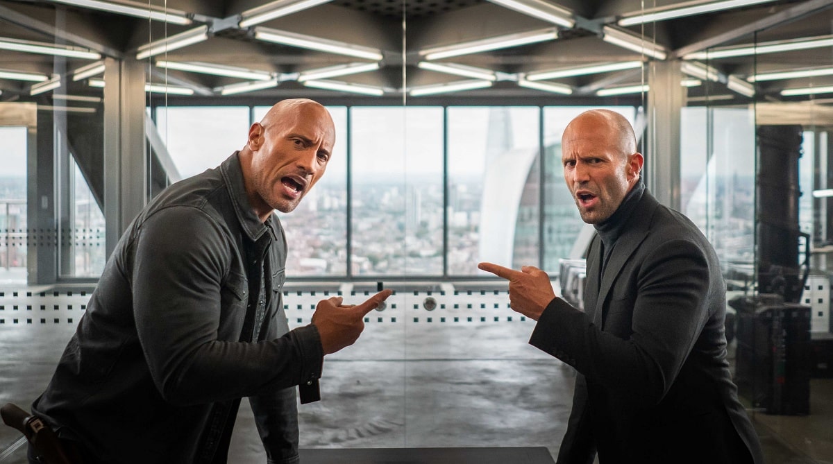 Dwayne Johnson as Luke Hobbs and Jason Statham as Deckard Shaw in the 2019 buddy action-comedy film Fast & Furious Presents: Hobbs and Shaw