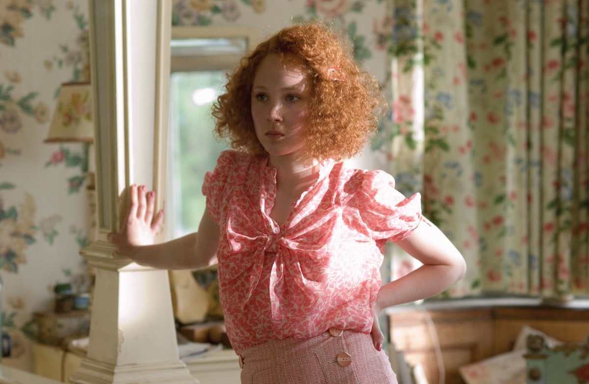 Juno Temple as Lola Quincey in the 2007 romantic war drama film Atonement