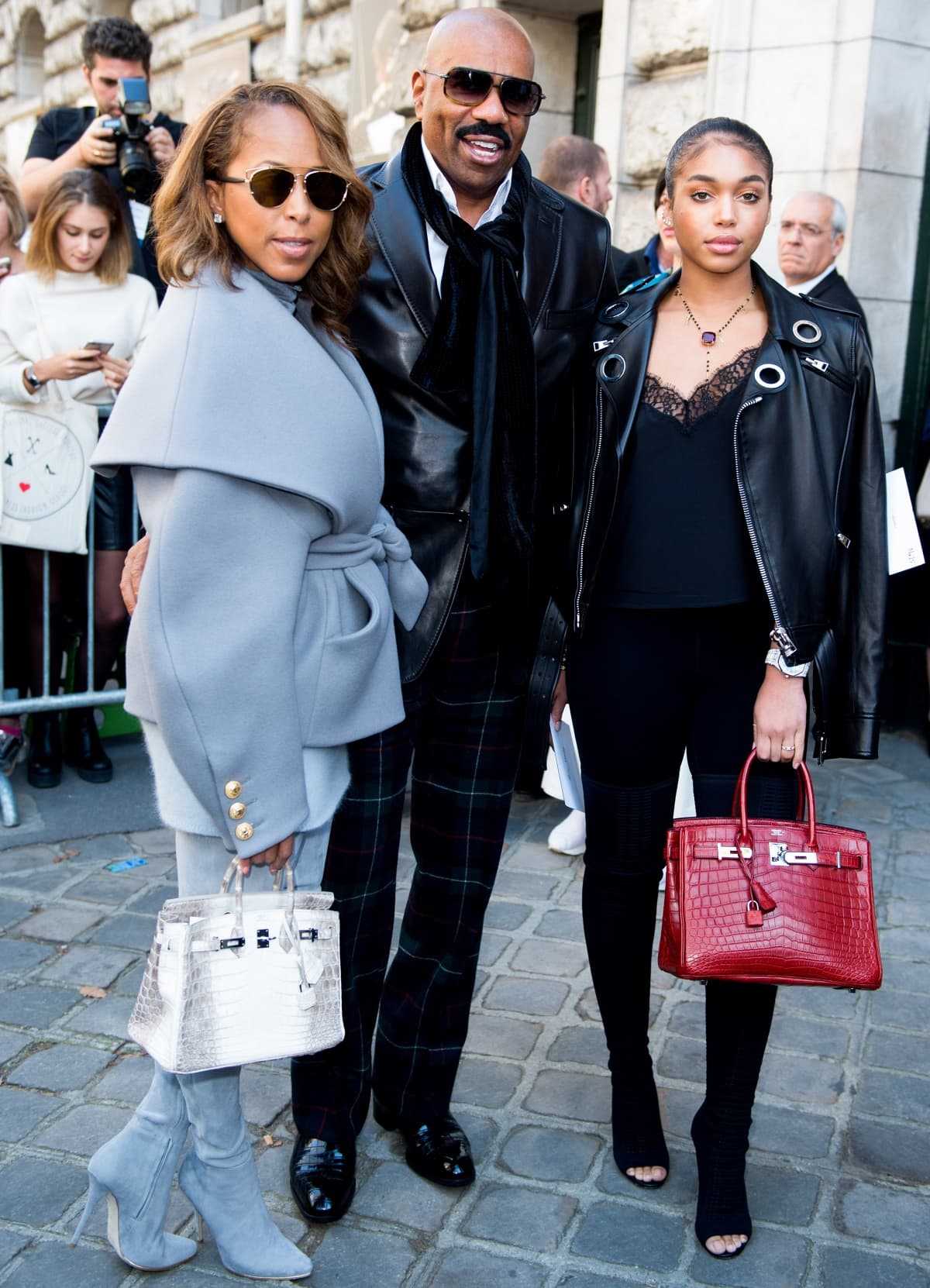 Marjorie, Steve, and Lori Harvey seen at the Hermes Spring/ Summer 2017 runway show during Paris Fashion Week