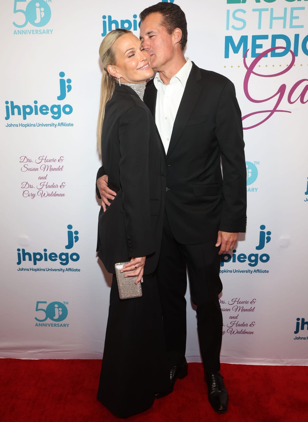 Molly Sims getting cozy with husband Scott Stuber at the 2022 Jhpiego Awards Ceremony