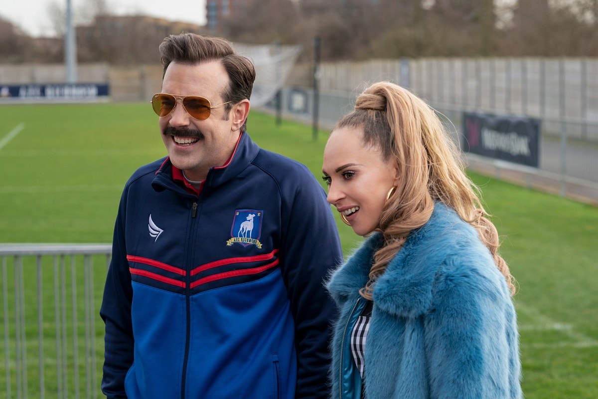 Jason Sudeikis as Ted Lasso and Juno Temple as Keeley Jones in the sports comedy-drama television series Ted Lasso