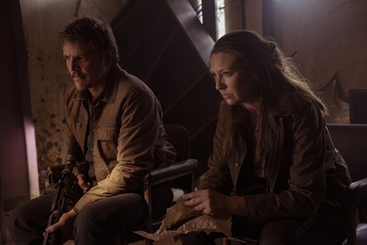 Pedro Pascal as Joel Miller and Anna Torv as Tess in the post-apocalyptic drama television series The Last of Us