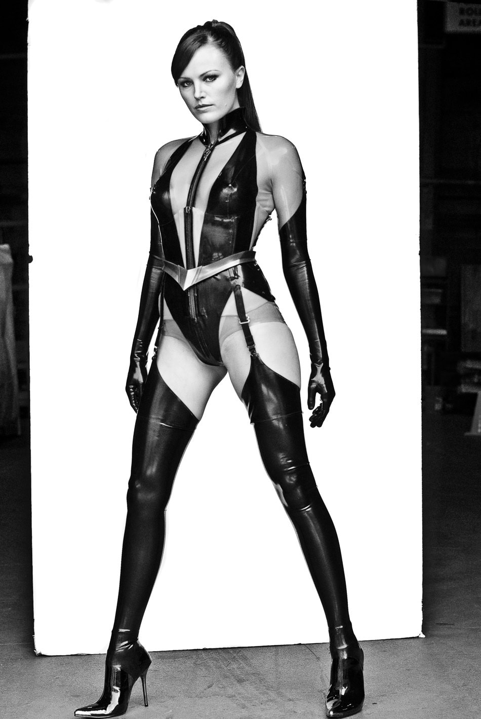 Malin Akerman in a promo shot for Watchmen showcasing her full costume
