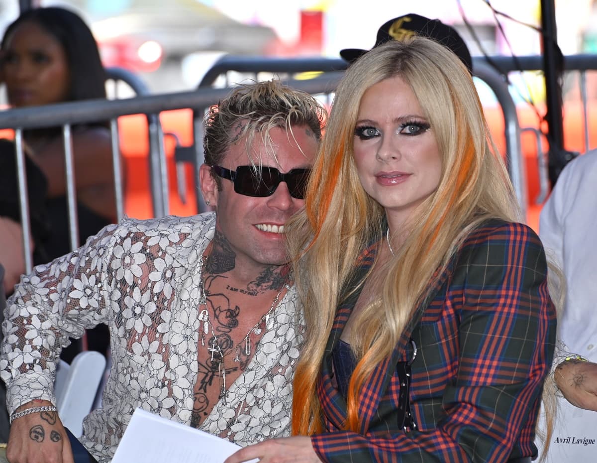Pop-punk musicians Avril Lavigne and Mod Sun met in January 2021, collaborated on the single "Flames," and were first romantically linked the following month before getting engaged in April 2022