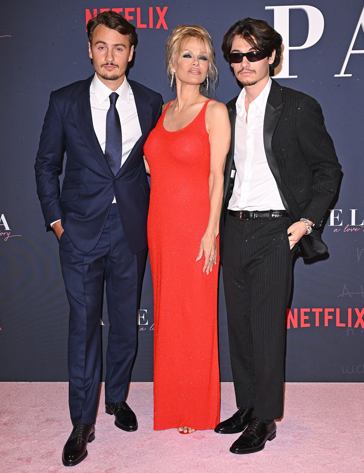 Pamela Anderson is joined on the red carpet by her sons Brandon Thomas and Dylan Jagger, whom she shares with her first husband Tommy Lee