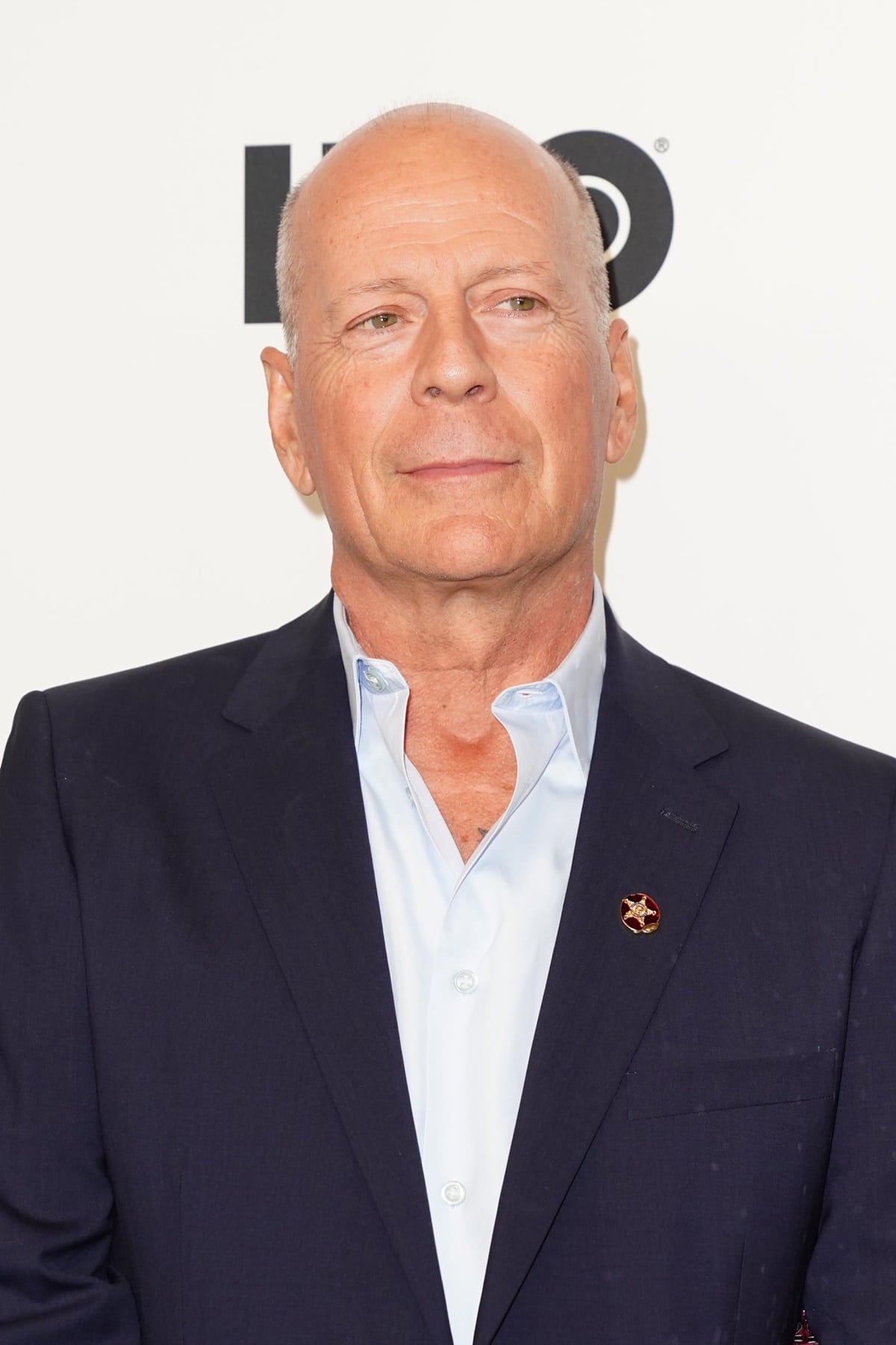 Bruce Willis' family, including his wife Emma, children, ex-wife Demi Moore, and their children, are rallying behind the actor after he was diagnosed with frontotemporal dementia