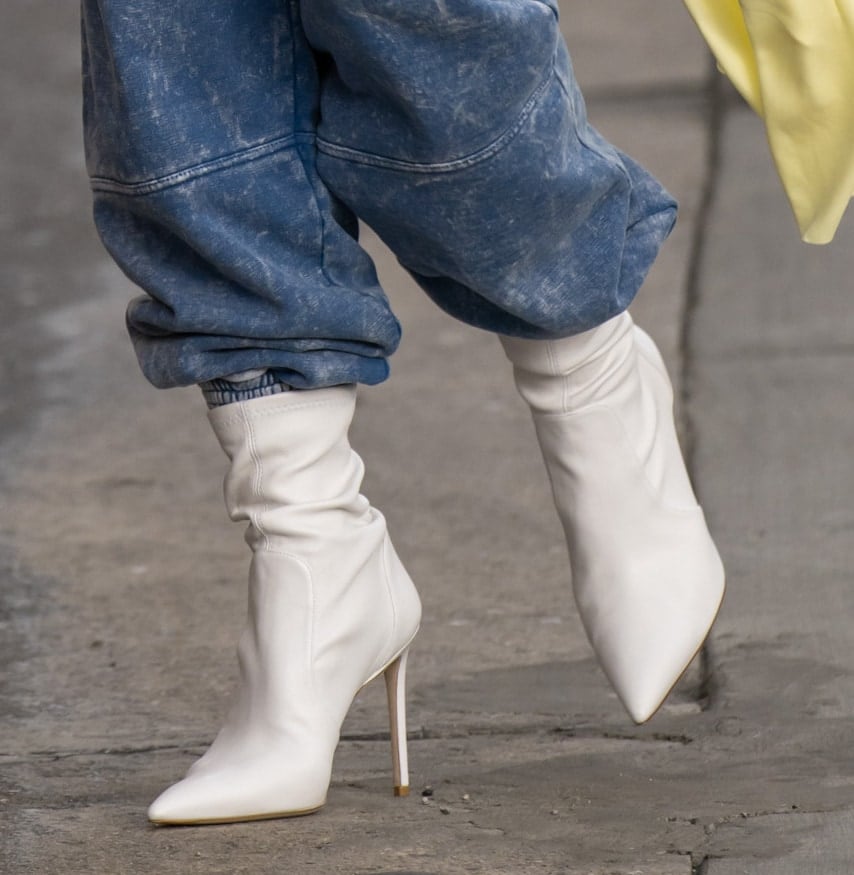 Cate Blanchett finishes her elevated casual look with white Stuart Weitzman sock booties