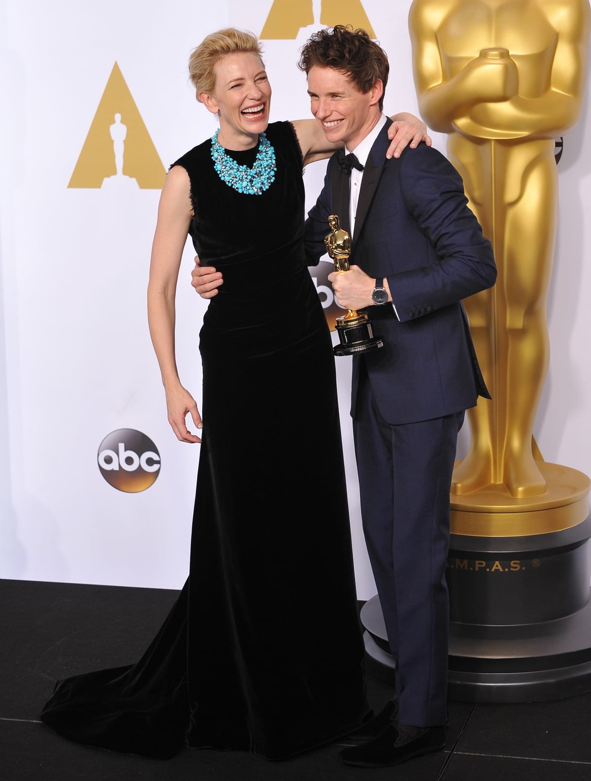 Cate Blanchett and Eddie Redmayne pose in the press room during the 87th Annual Academy Awards