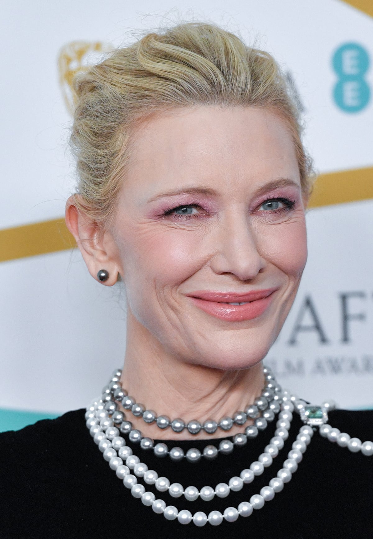 Cate Blanchett wears pink makeup and updates her recycled gown with repurposed Louis Vuitton Tahitian pearl necklace