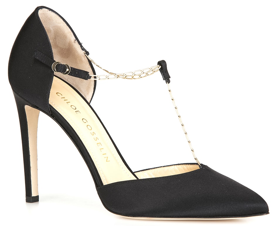The Chloe Gosselin pump features a chain T-bar strap, pointy toe, and a high heel