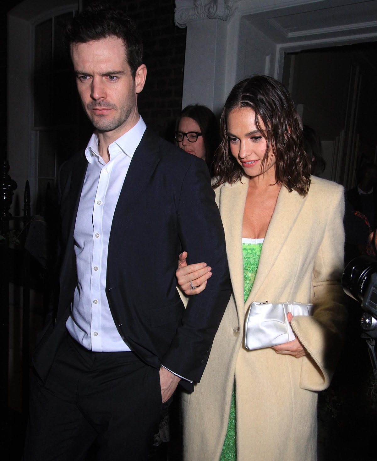 Lily James walks arm-in-arm with her brother Charlie outside London’s Soho House following the after party of What's Love Got To Do With It?