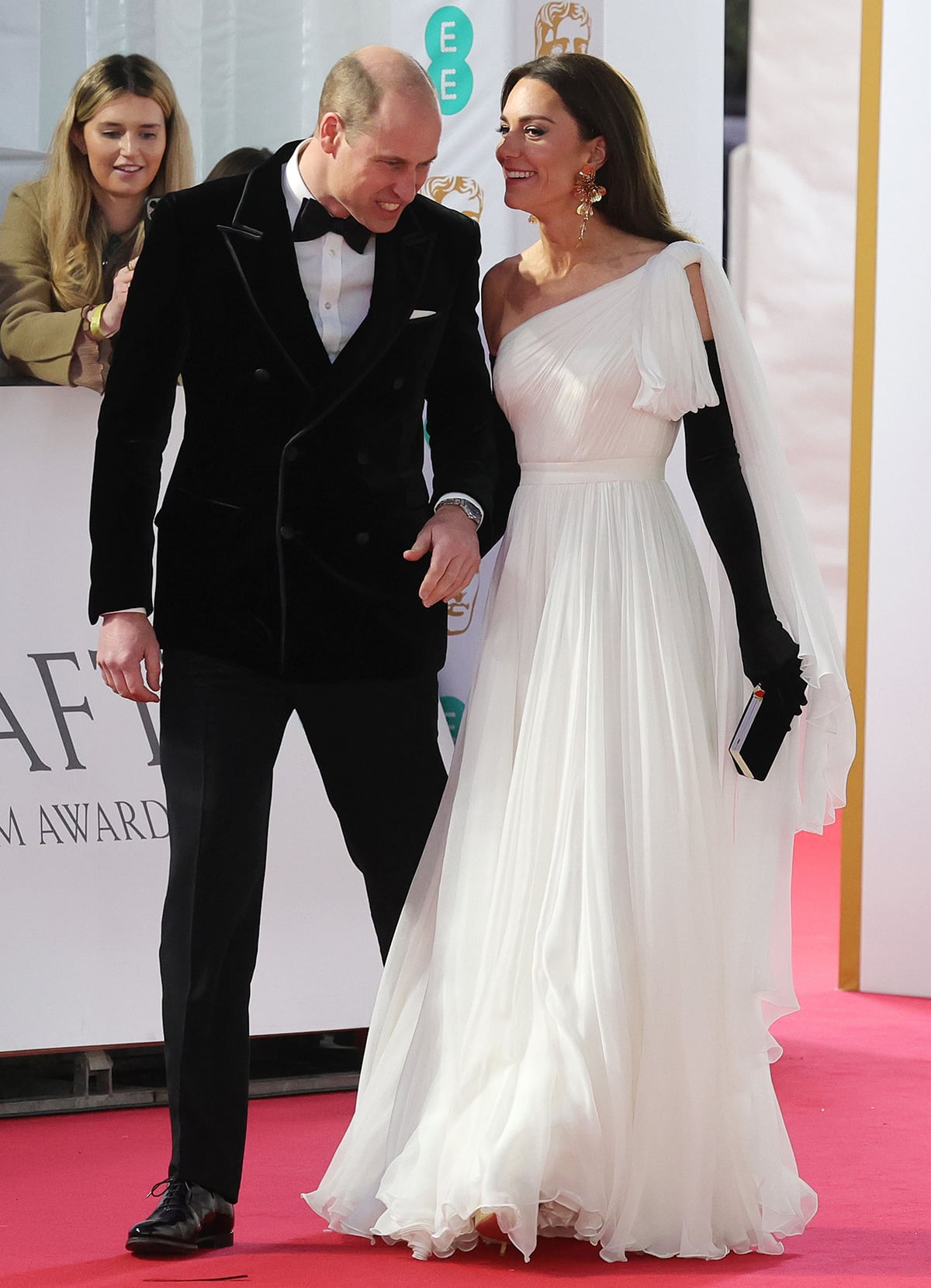 The Prince and Princess of Wales display affection towards each other on the BAFTAs red carpet on February 19, 2023